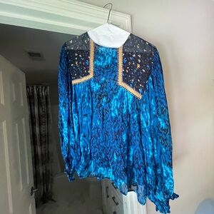 Embellished blue Anthropologie blouse.